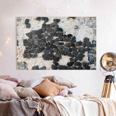 Impression sur toile - Wall With Black Stones