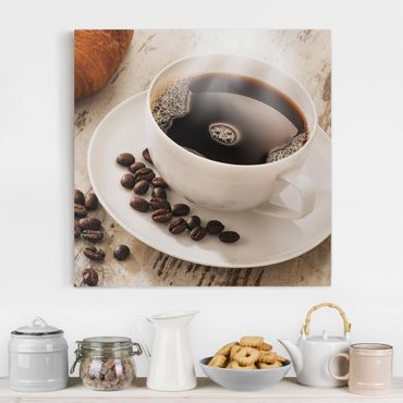 Impression sur toile - Steaming coffee cup with coffee beans