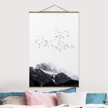 Tableau en tissu avec porte-affiche - Flock Of Birds In Front Of Mountains Black And White