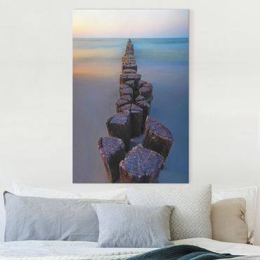 Tableau sur toile - Groynes At Sunset At The Ocean