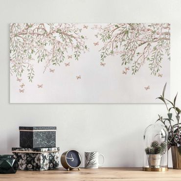 Impression sur toile - Les fleurs de cerisier dans le jeu d'ailes des papillons - Format paysage 2:1