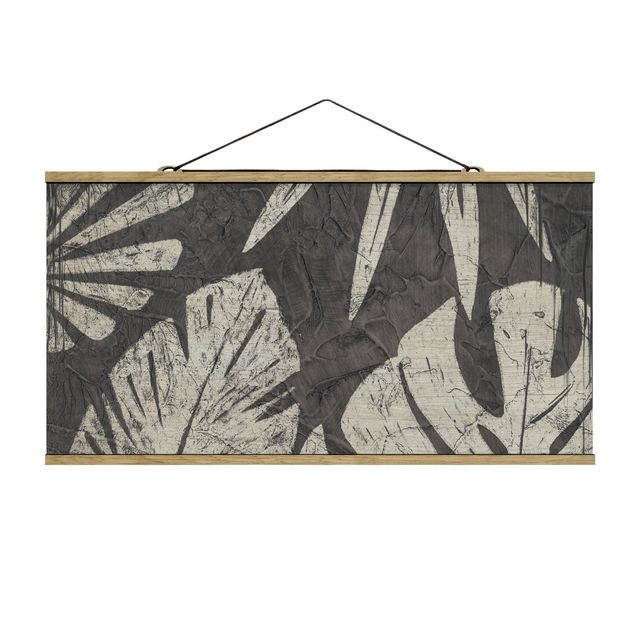 Tableau floral mural Feuilles de palmier sur fond gris foncé