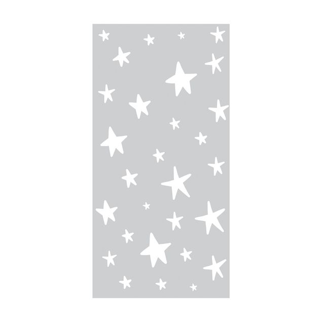 tapis contemporain Grandes étoiles dessinées dans le ciel gris