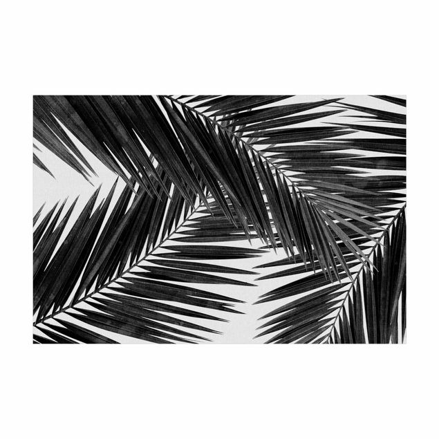 tapis jungle Vue sur des feuilles de palmier noir et blanc