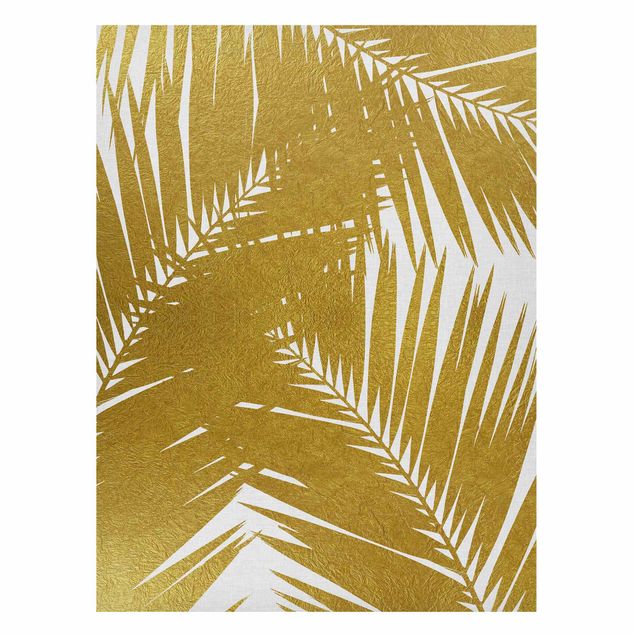 Tableau paysages Vue à travers des feuilles de palmier dorées