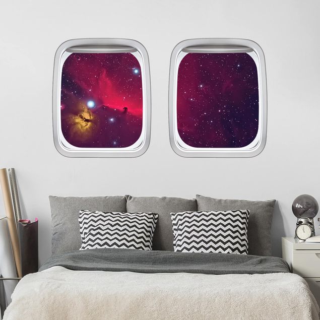 Déco chambre bébé Hublot d'avion Galaxie colorée