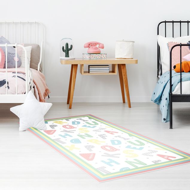 Décoration chambre bébé Alphabet en couleurs pastel avec cadre