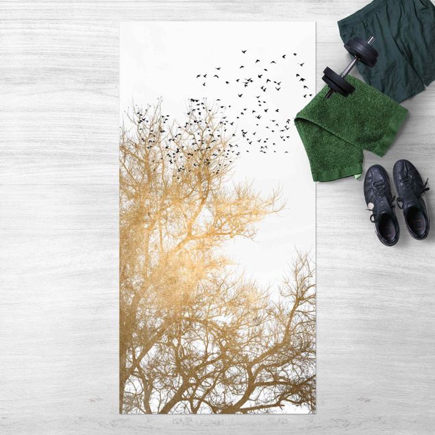 tapis extérieur Foule d'oiseaux devant un arbre doré