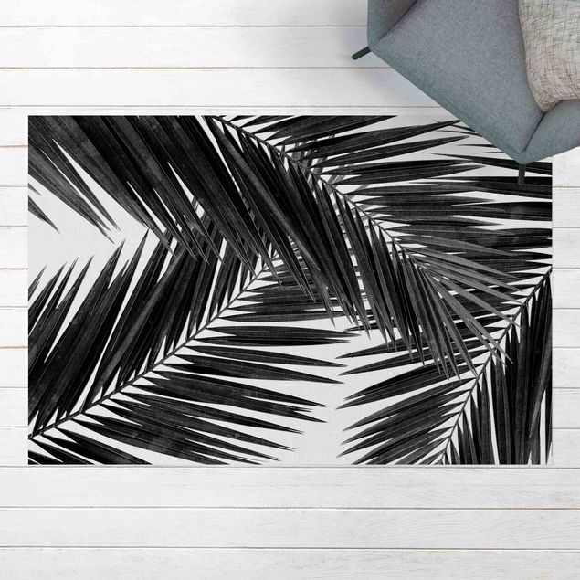 tapis extérieur Vue sur des feuilles de palmier noir et blanc
