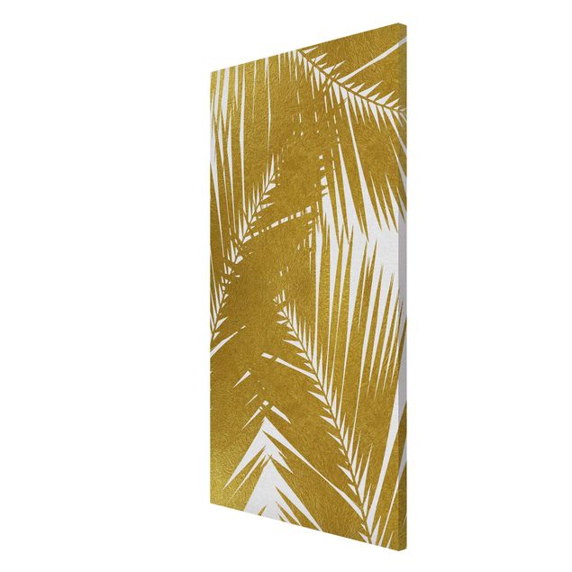 Tableaux magnétiques avec fleurs Vue à travers des feuilles de palmier dorées