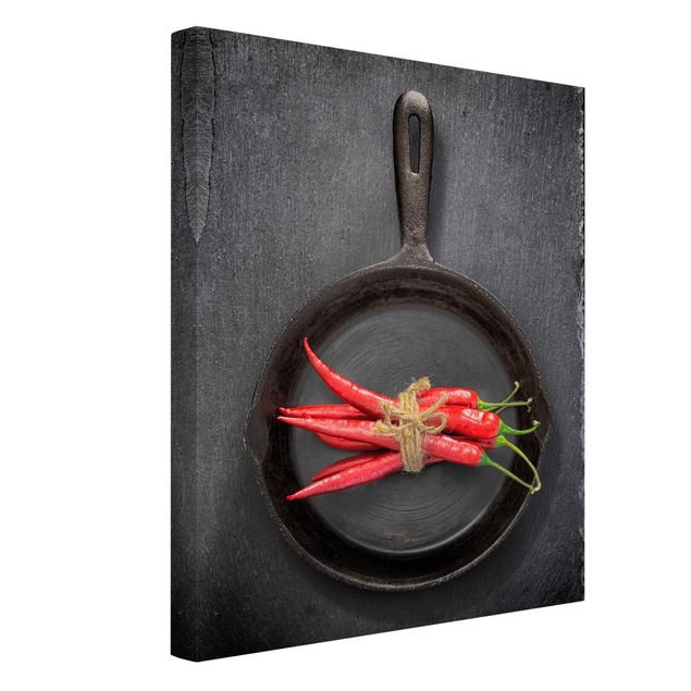 Reproduction tableau impression sur toile Faisceaux de piments rouges dans une casserole sur une ardoise