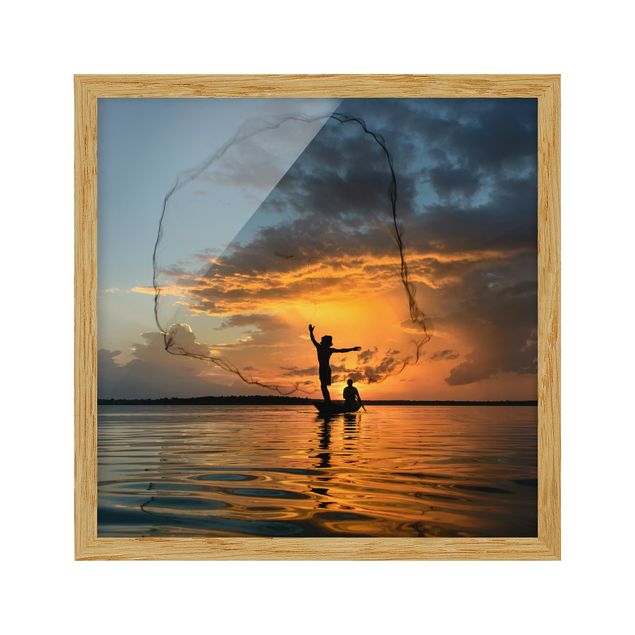 Tableau bord de mer Filet de pêche au coucher du soleil