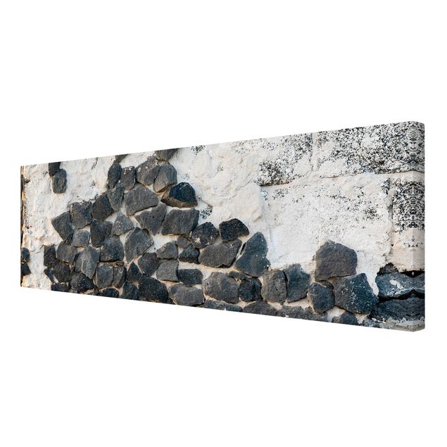 Tableaux gris Mur avec pierres noires