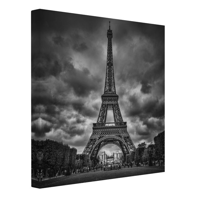 Tableau toile ville Tour Eiffel devant des nuages en noir et blanc