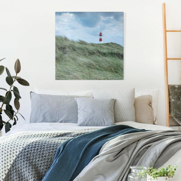 Tableaux sur toile avec dunes Temps orageux au phare