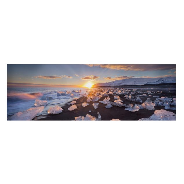 Toiles coucher de soleil Morceaux de glace sur la plage en Islande