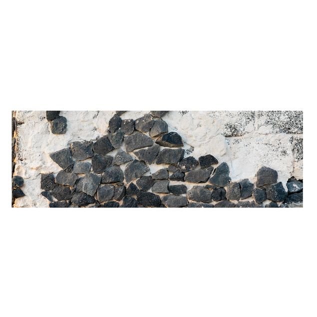 Reproduction tableau sur toile Mur avec pierres noires
