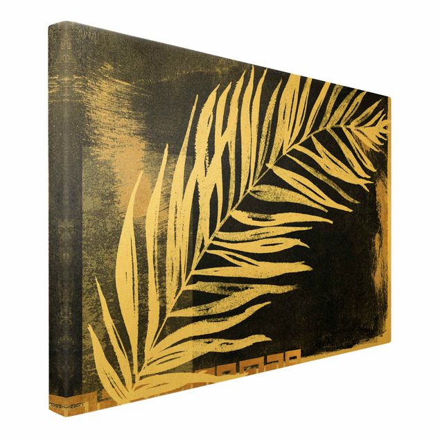 Toile murale Feuille de palmier sur noir et or