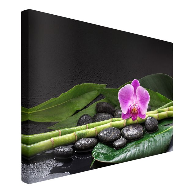 Tableau toile bambou Bambou vert avec fleur d'orchidée