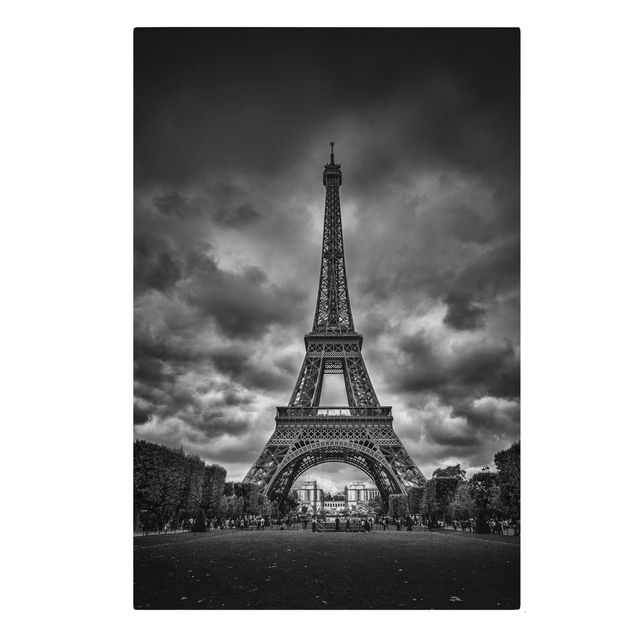 Tableaux sur toile en noir et blanc Tour Eiffel devant des nuages en noir et blanc