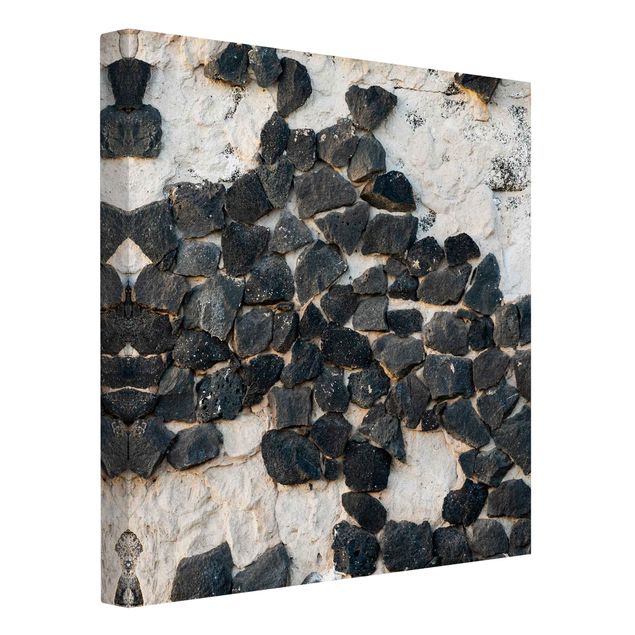Tableau reproduction Mur avec pierres noires