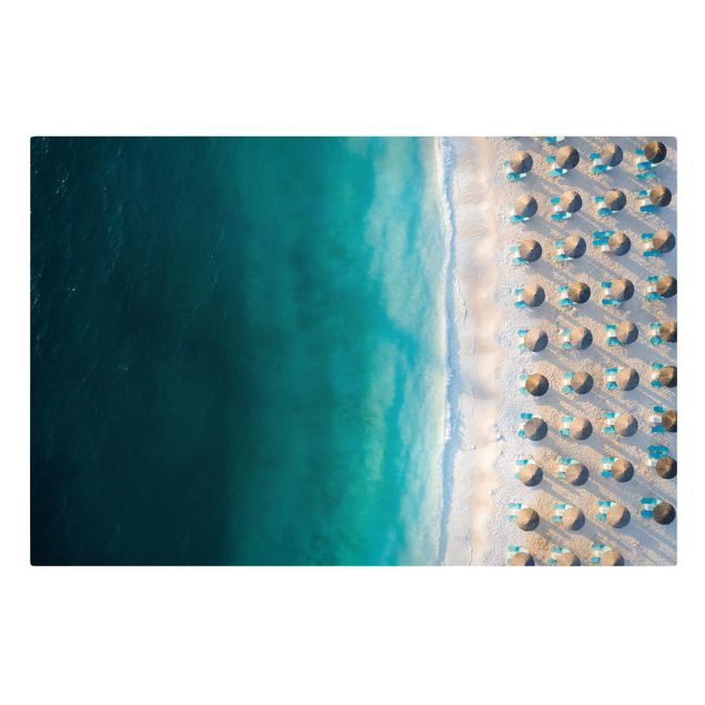 Tableaux modernes Plage de sable blanc avec parasols de paille