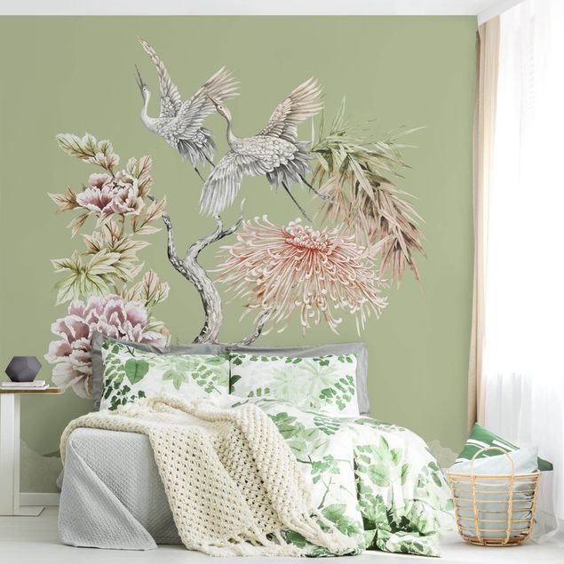 Déco murale cuisine Aquarelle - Cigognes en vol avec des fleurs sur un fond vert
