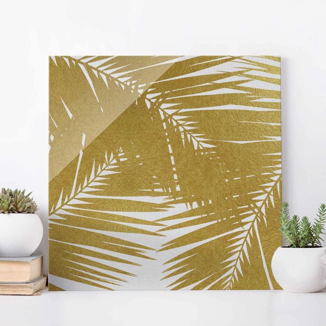 Décorations cuisine Vue à travers des feuilles de palmier dorées