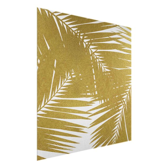 Tableaux modernes Vue à travers des feuilles de palmier dorées
