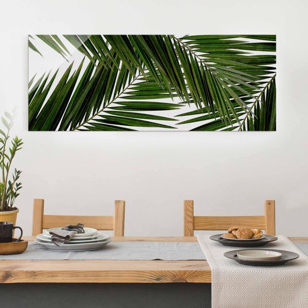 Déco murale cuisine Vue à travers des feuilles de palmier vertes