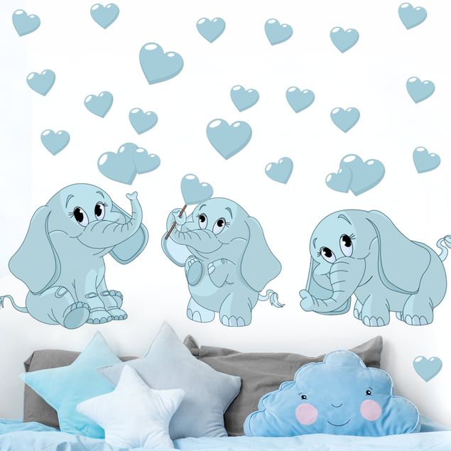 Déco chambre bébé Trois éléphanteaux bleus avec des cœurs