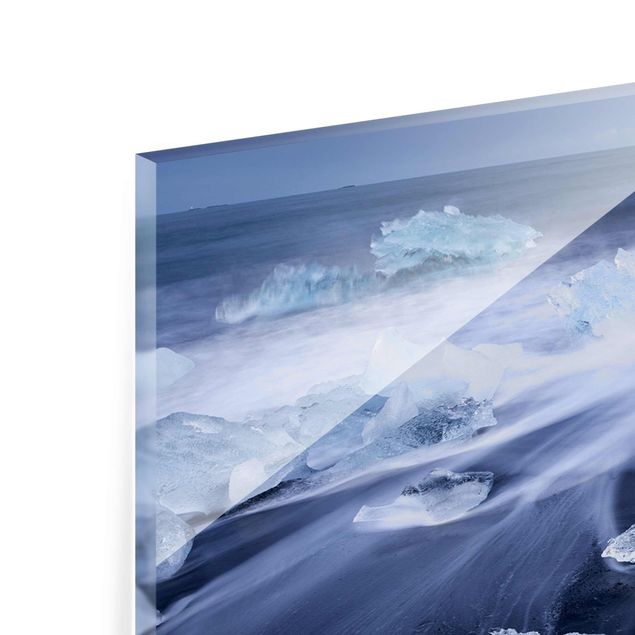 Tableau verre paysage Morceaux de glace sur la plage à l'est de l'Islande Islande