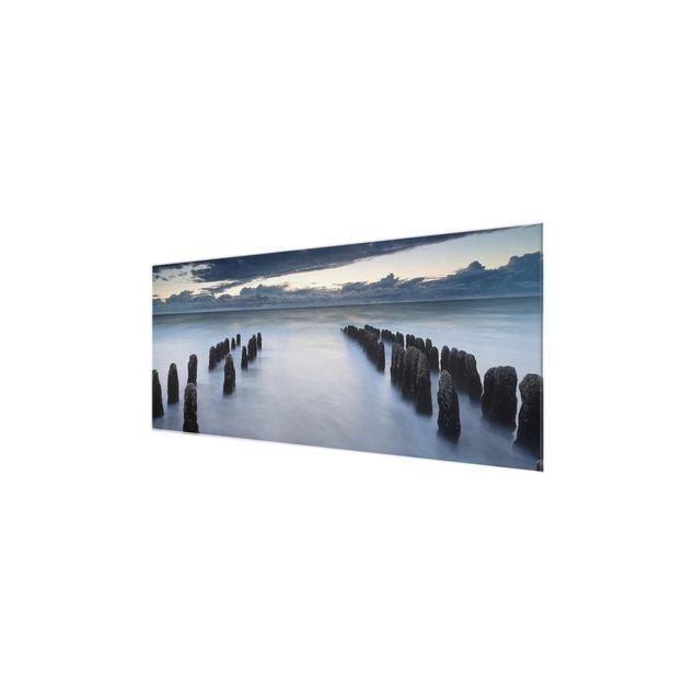 Tableau verre paysage Vieux poteaux en bois dans la mer du Nord à Sylt