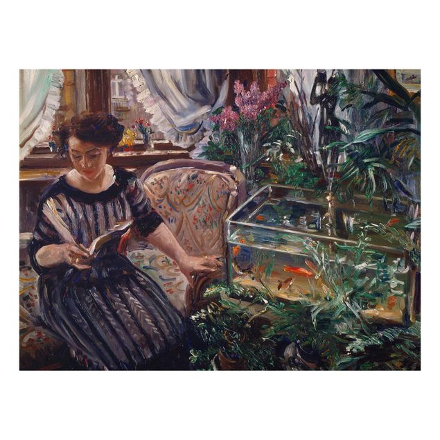 Tableau reproduction Lovis Corinth - Une femme lisant près d'un aquarium à poissons rouges