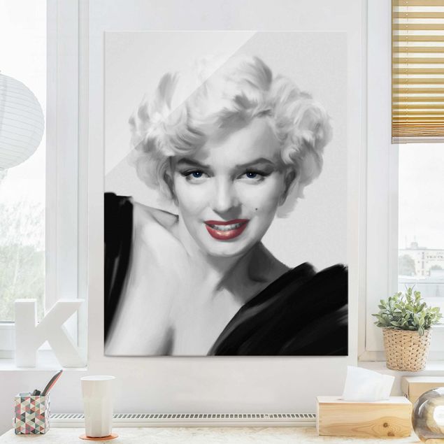 Tableaux en verre noir et blanc Marilyn sur le canapé