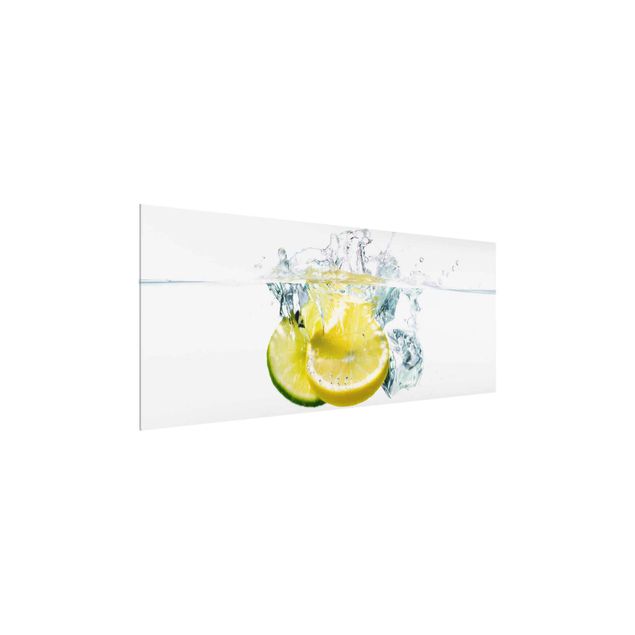 Tableaux en verre fleurs Citron et citron vert dans l'eau