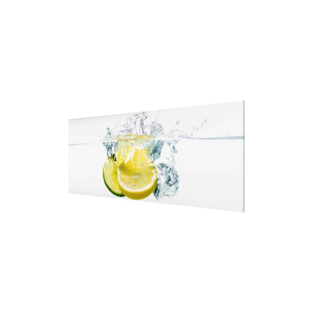 Tableaux en verre magnétique Citron et citron vert dans l'eau