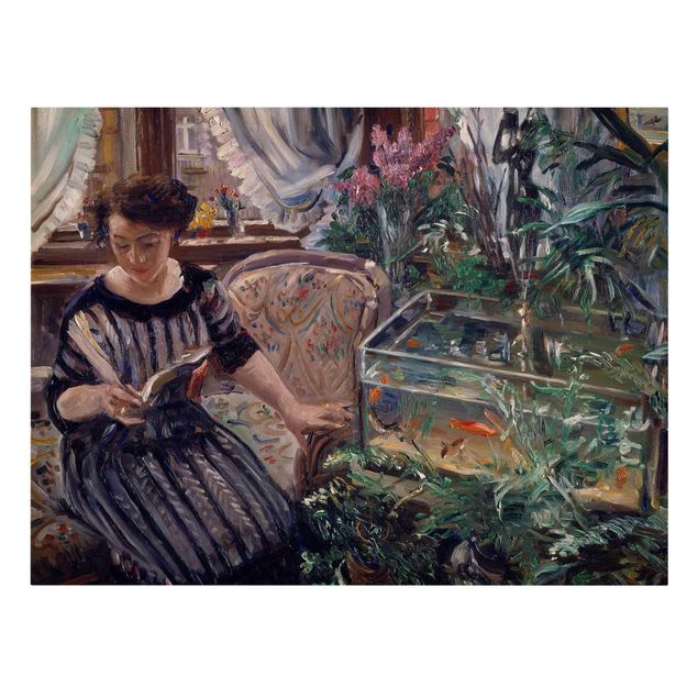 Tableaux reproduction Lovis Corinth - Une femme lisant près d'un aquarium à poissons rouges