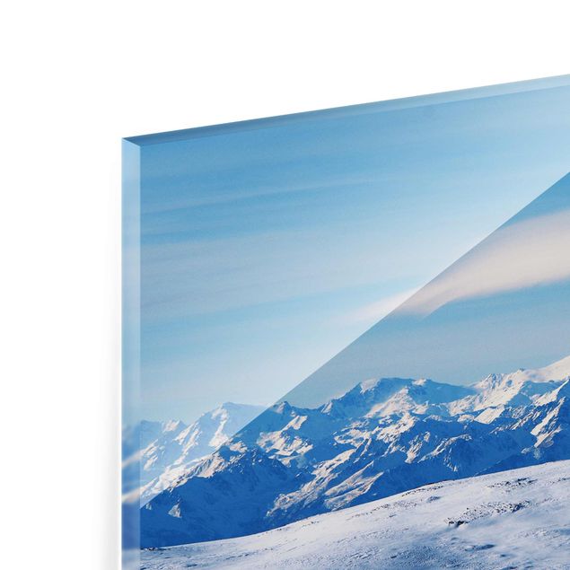 Tableau verre paysage Paysage de montagne enneigé