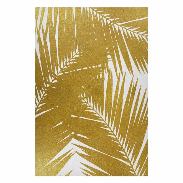 Tableau paysages Vue à travers des feuilles de palmier dorées