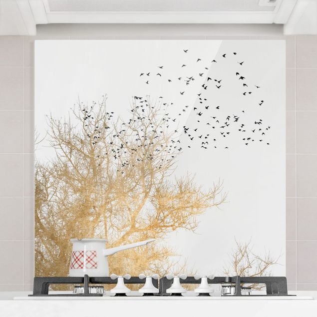 Décorations cuisine Foule d'oiseaux devant un arbre doré