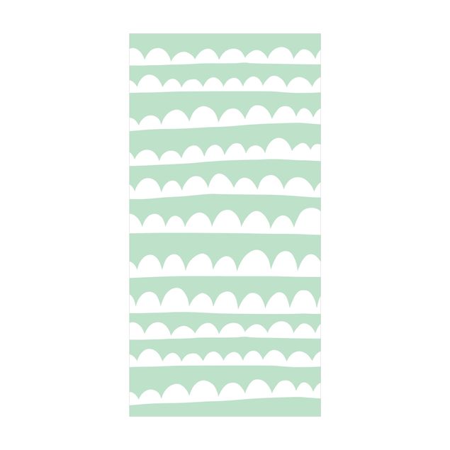 tapis modernes Bandes blanches dessinées de nuages dans un ciel vert