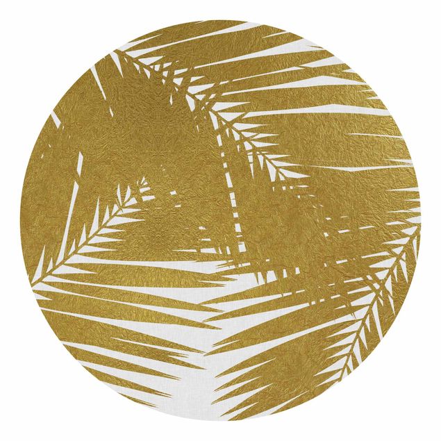Papier peint doré Vue à travers des feuilles de palmier dorées