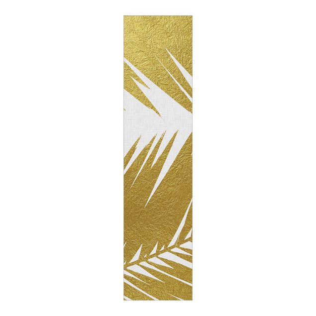 Panneaux coulissants avec fleurs Vue à travers des feuilles de palmier dorées
