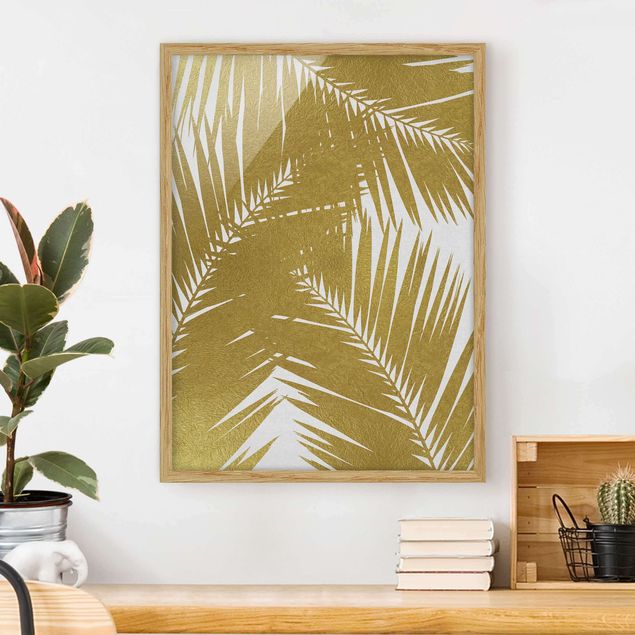 Tableaux paysage Vue à travers des feuilles de palmier dorées