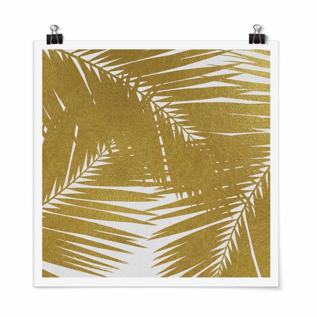 Tableau fleurs Vue à travers des feuilles de palmier dorées