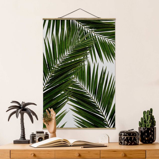 Déco mur cuisine Vue à travers des feuilles de palmier vertes
