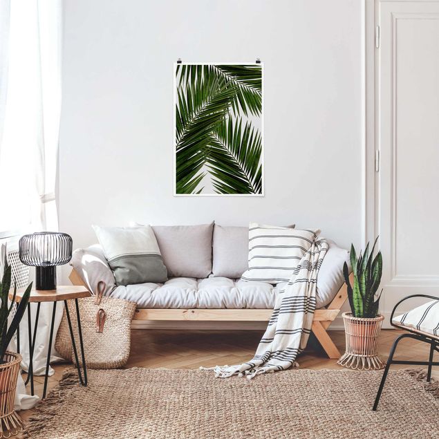 Tableaux paysage Vue à travers des feuilles de palmier vertes