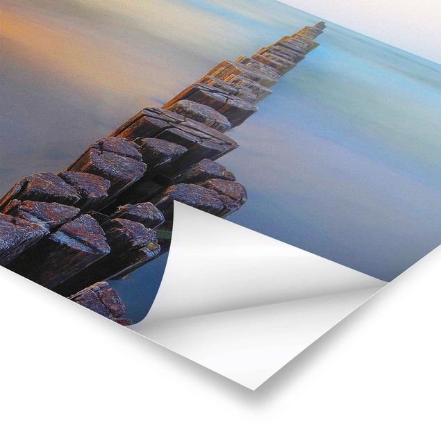 Posters paysage Groynes au coucher du soleil sur l'océan