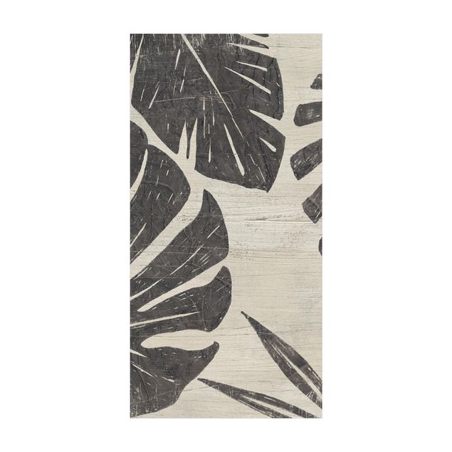 tapis contemporain Feuilles de palmier sur fond gris clair